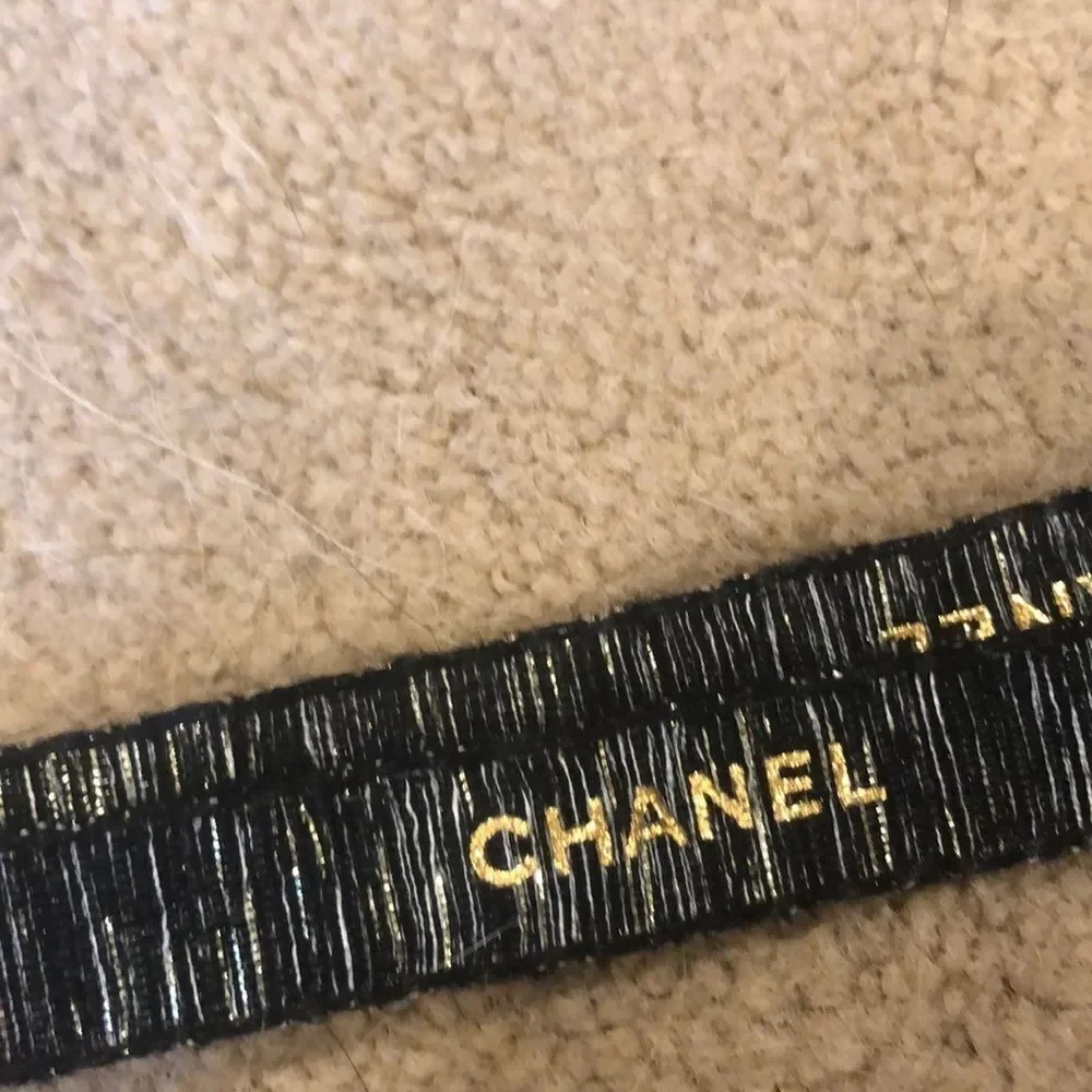 Chanel holiday ribbon it’s black and white